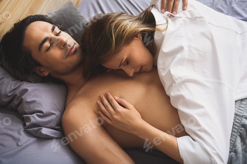 Preview: Young Couple Resting In A Bed