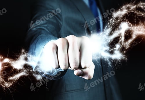 Preview: Close Up Of Businessman Hand Holding Lightning In Fist