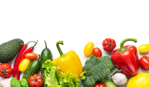 Preview: Fresh healthy vegetables creating nutritious food border on white