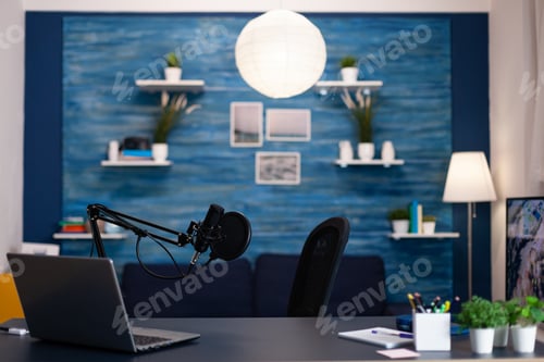 Preview: Empty podcast studio with nobody in it equipped with professional production podcasting equipment