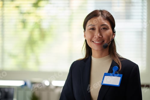 Preview: Positive Businesswoman with Empty Badge