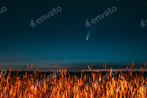 Preview: Belarus. 17 July 2020. Comet Neowise C 2020 F3 Shines Bright In The Night Starry Sky Above Young