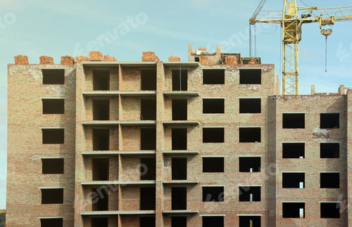 Preview: View of a large construction site with buildings under construction and multi-storey resid