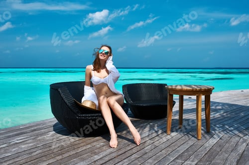 Preview: Woman On A Tropical Beach Jetty At Maldives