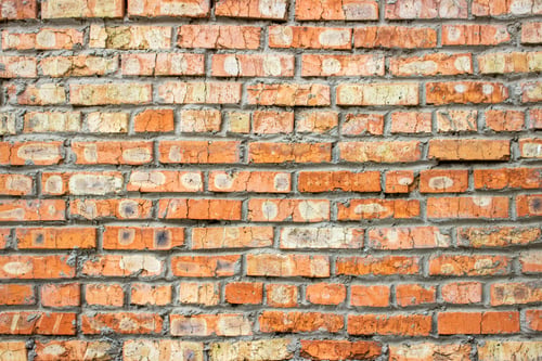 Preview: Background of old vintage dirty brick wall with peeling plaster, texture
