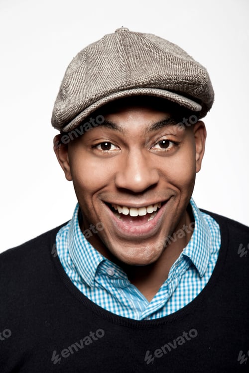 Preview: Portrait of man wearing cap, laughing