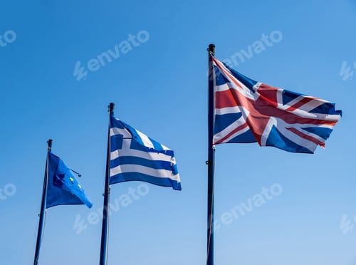 Preview: Greek flag waving against clear blue sky background.