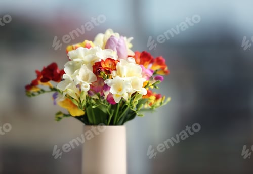 Preview: Beautiful bouquet of freesia flowers on blurred background
