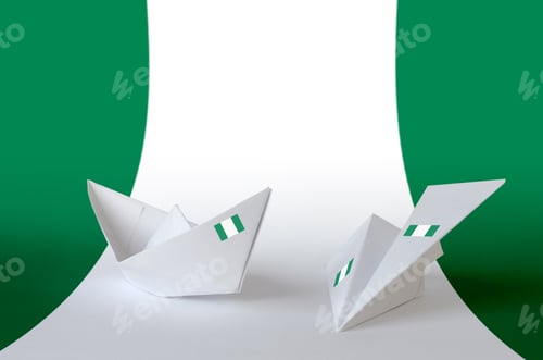 Preview: Nigeria flag depicted on paper origami airplane and boat. Oriental handmade arts concept