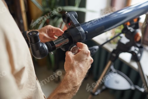 Preview: Man using telescope