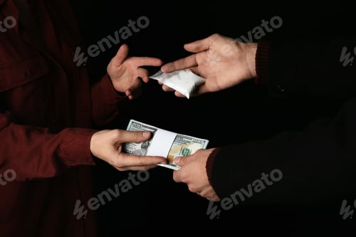 Preview: Drug dealer selling cocaine to addict on black background, closeup