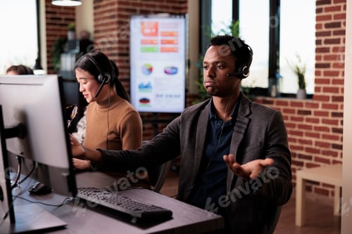 Preview: African american employee working at call center helpline support