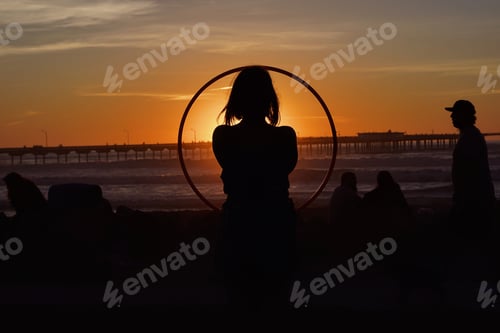 Preview: Girl enjoying the sunset.