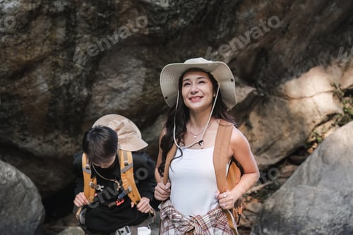 Preview: An Asian couple spent their vacation hiking along nature trail, visiting waterfall and enjoying