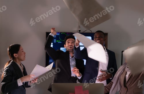 Preview: Group of business people discussing the charts and graphs showing the results of their successful