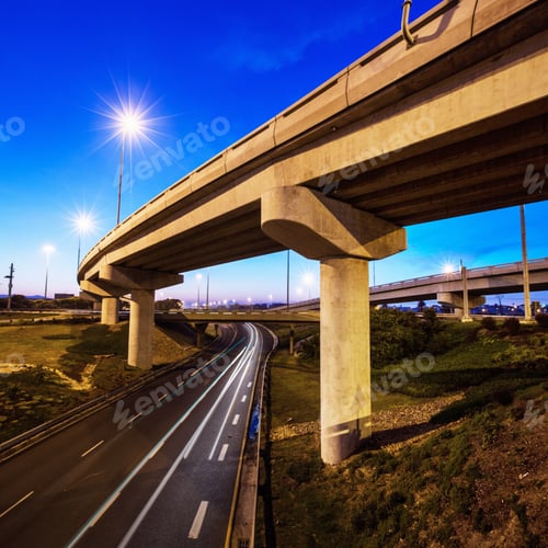 Preview: A cropped shot of a concrete overpass on a stretch of road
