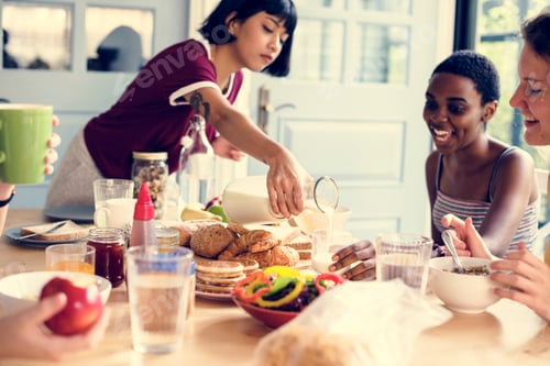 Preview: A group of diverse women having breakfast together