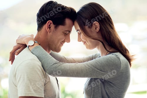 Preview: They share a deep love. Shot of a young couple sharing a tender moment.