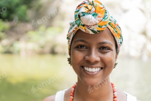 Preview: Smiling Woman Wearing Colorful Headscarf Outdoors