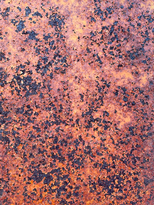 Preview: Rusty Texture. Dark worn textured metal surface close up.