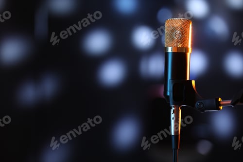 Preview: Microphone on stand against dark background with blurred lights, space for text. Bokeh effect