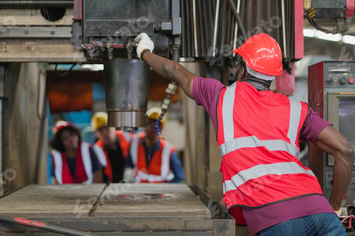 Preview: Group of heavy industrial worker checking and repairing big machine