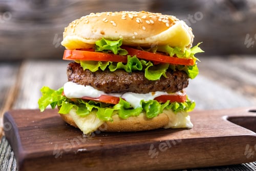Preview: hamburger on a wooden background