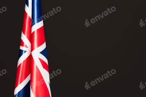 Preview: national flag of united kingdom with red cross isolated on black with copy space