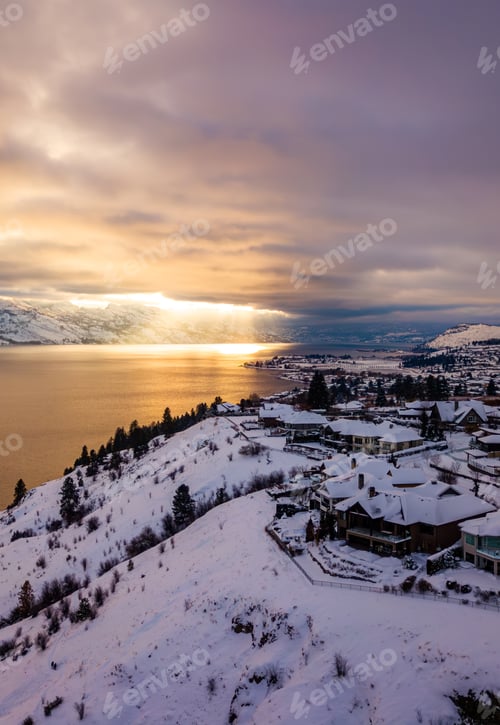 Preview: Snowy Landscape at Sunrise with Mountains and Lake