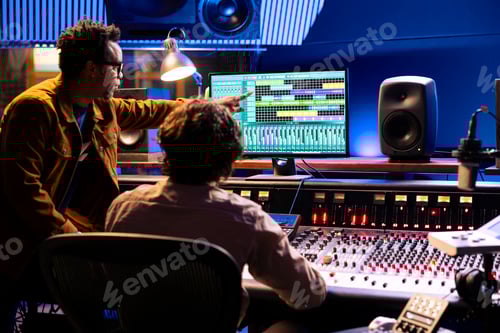 Preview: Sound Engineer Instructs on Audio Production at Console