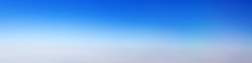 Preview: The banner blue sky gradient. A clear sunset sky turning into a bright blue. Copy space