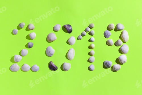 Preview: New Year. Holiday Card Made Of Seashells. Creative Greeting Card For Christmas. Year Of Yellow