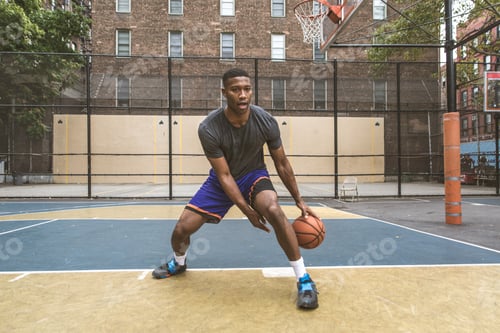 Preview: Basketball player training outdoors