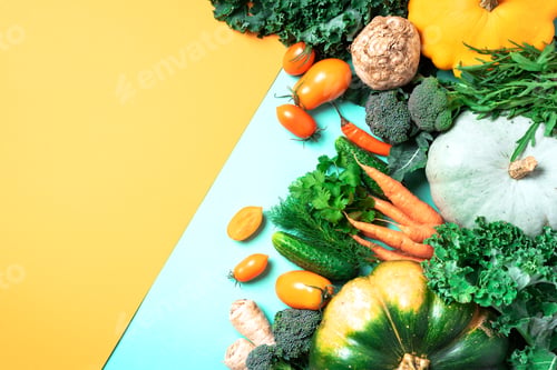 Preview: Autumn vegetables on trendy yellow and green background. Top view. Vegan and vegetarian diet