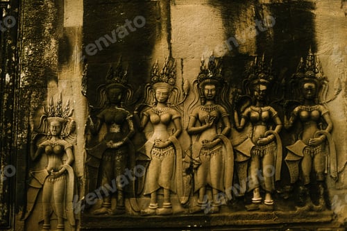 Preview: Facade of old building with ornamented women