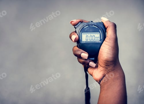 Preview: Hand holding a stopwatch