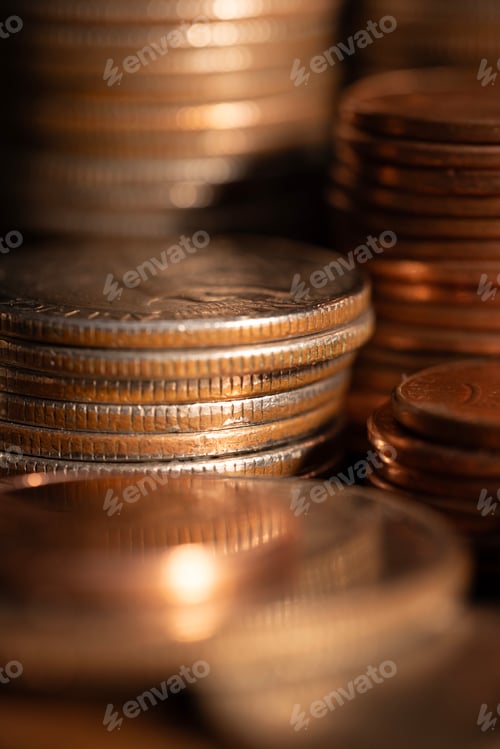 Preview: A stack of dollar coins stacked on each other in different positions. Money