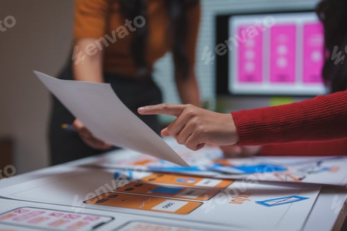 Preview: Designers collaborating on mobile app prototype