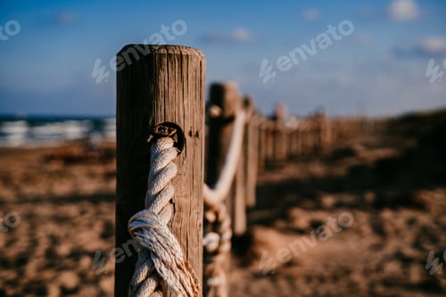 Preview: Wooden path on the beach of a natural park in Spain with ocean view. Sunset. Vacation and relax