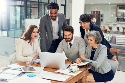 Preview: Cropped shot of a group of businesspeople meeting in the boardroom