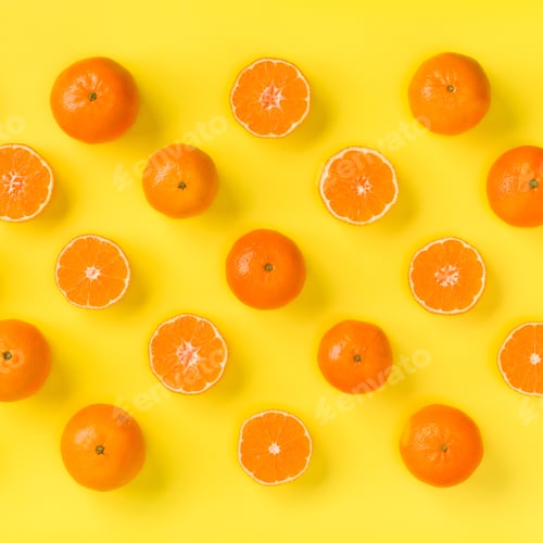 Preview: Fruit pattern of fresh mandarin slices on yellow background. Pop art design, creative summer concept