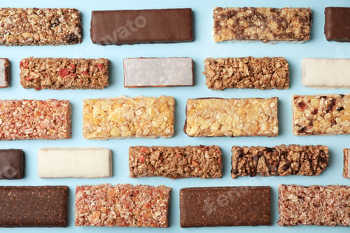 Preview: Flat lay composition with protein bars on color background