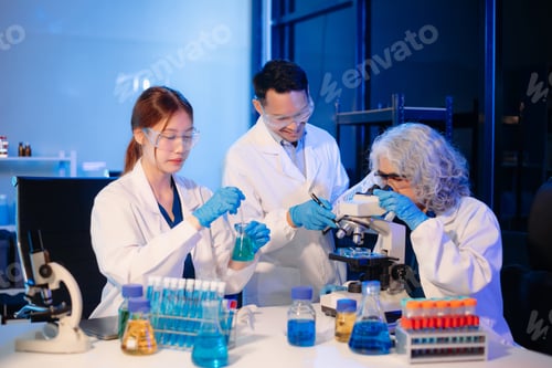 Preview: Scientists in lab coats collaborating with test tubes, flasks, and microscopes in a modern lab.