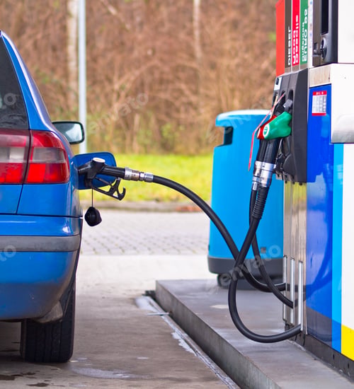 Preview: Blue car at gas station
