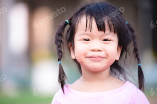Preview: Sweet smiley girl. Cute baby is dry and chapped lips.