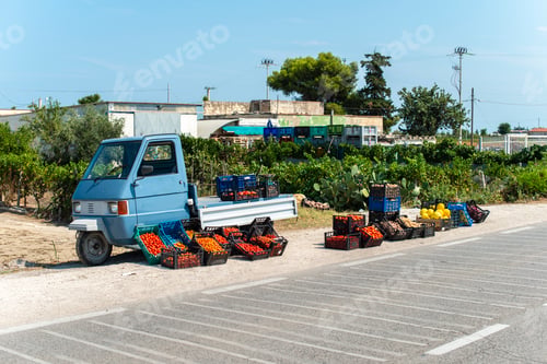 Preview: Small italian apo truck with tomatoes. Farmer sale tomatoes on t