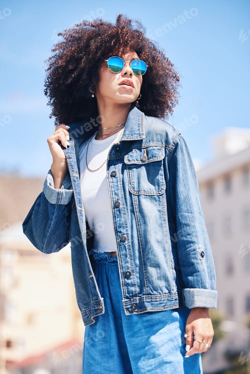 Preview: Woman with Afro Wearing Denim Jacket Outdoors