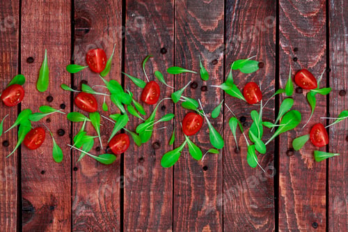 Preview: Wooden background with basil leaves and cherry tomatoes. Copy space, top view.
