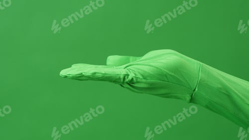Preview: Hand wear chroma key suit on on green screen background