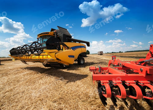 Preview: combine harvester on stubble wheat field